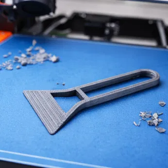 Dụng cụ cạo bàn in 3D tối giản