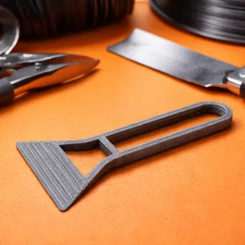Dụng cụ cạo bàn in 3D tối giản