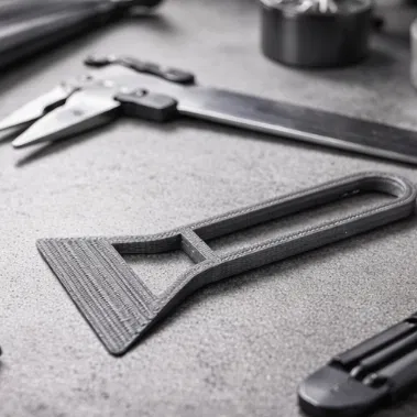 Dụng cụ cạo bàn in 3D tối giản