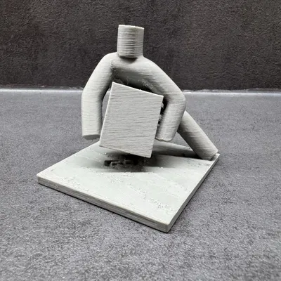 Exekutor bere pračku – Tượng chấp hành viên khiêng máy giặt (Brno)