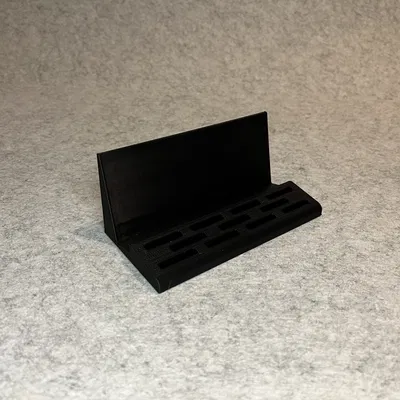 Đế dựng Nintendo Switch và khay đựng 11 băng game tiện lợi