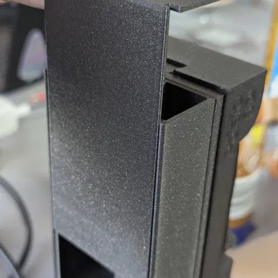 Nắp đậy đối trọng cải tiến cho đế giữ tay cầm Xbox và tai nghe