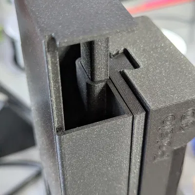 Nắp đậy đối trọng cải tiến cho đế giữ tay cầm Xbox và tai nghe