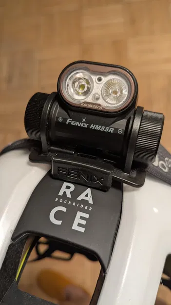 Ngàm gắn đèn pin đội đầu Fenix HM55R lên nón bảo hiểm - Image 1