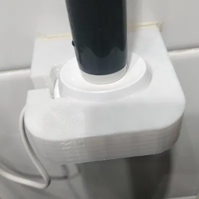 Giá treo tường tích hợp sạc cho bàn chải điện Oral B