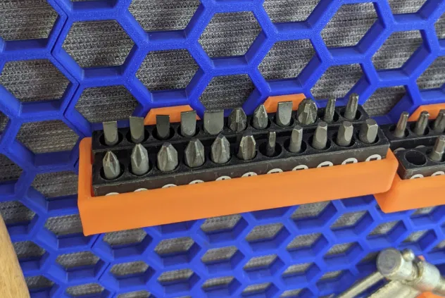 Giá treo mũi vít thông minh cho bảng Honeycomb Wall - Image 1