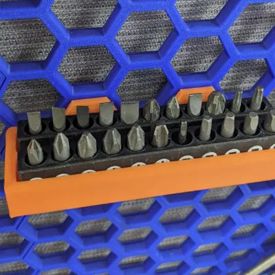 Giá treo mũi vít thông minh cho bảng Honeycomb Wall