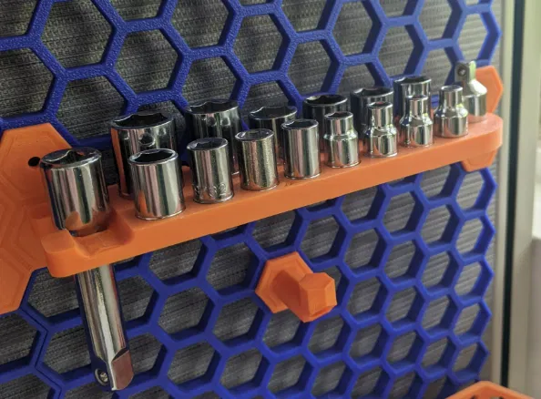 Khay treo đầu khẩu (socket holder) cho bảng Honeycomb Storage Wall - Image 1