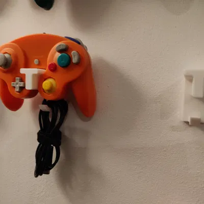 Giá treo tường cho tay cầm GameCube
