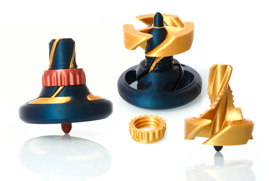 Con quay fidget toy có cơ chế xuyên qua (Passthrough spinning top) - Image 1