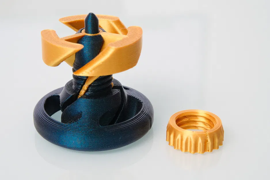 Con quay fidget toy có cơ chế xuyên qua (Passthrough spinning top) - Image 6