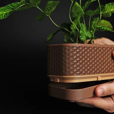 Chậu cây Komori với đế chứa nước tiện dụng