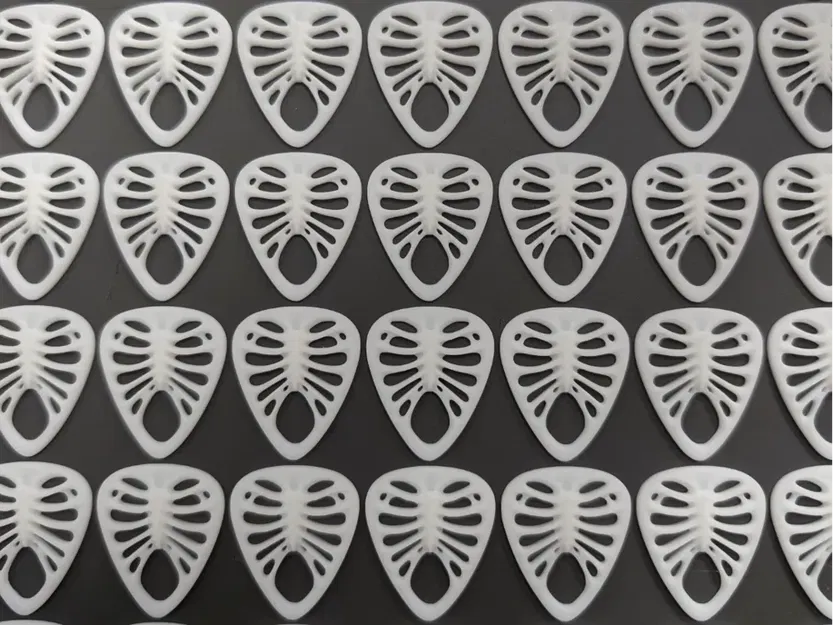 Miếng gảy đàn hình khung xương (Ribcage Guitar Pick) - Image 1