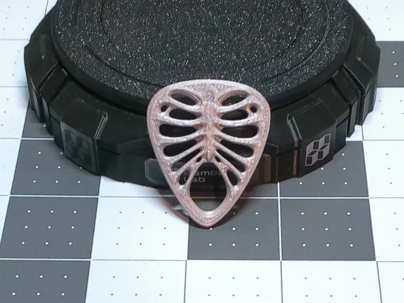 Miếng gảy đàn hình khung xương (Ribcage Guitar Pick) - Image 2