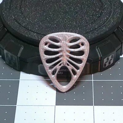 Miếng gảy đàn hình khung xương (Ribcage Guitar Pick)
