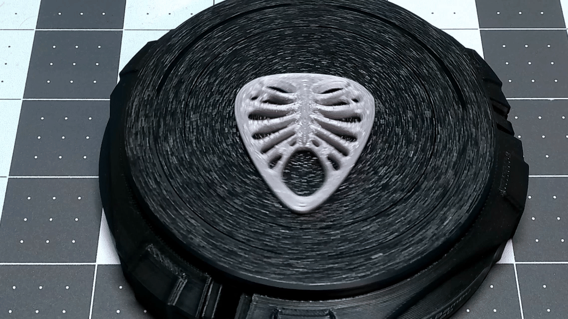 Miếng gảy đàn hình khung xương (Ribcage Guitar Pick)