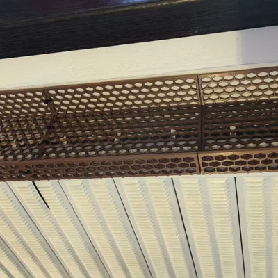 Vỉ đặt lò sưởi để làm khô bánh mì và vỏ trái cây