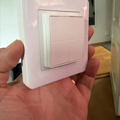 Khung gắn Shelly BLU Wall Switch 4 cho mặt nạ Schneider Exxact