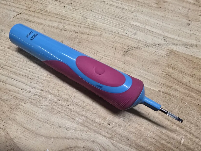 Dụng cụ hỗ trợ tháo rời bàn chải OralB - Image 2