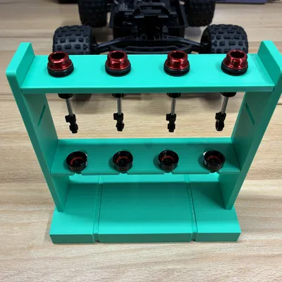 Đế giữ phuộc cho Arrma Grom và Mini Kraton