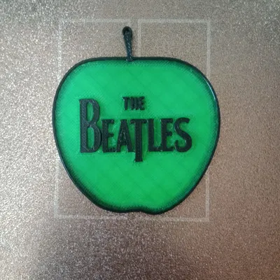 Móc khóa hình quả táo The Beatles