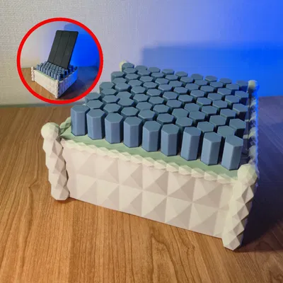 Giá đỡ điện thoại và máy tính bảng với bề mặt chốt thích ứng