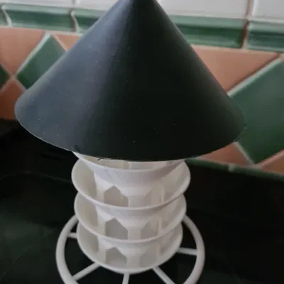 Máng ăn cho chim với vòng đậu phía dưới