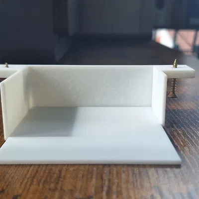 Giá đỡ cục sạc Macbook treo tường gọn gàng cho bàn làm việc