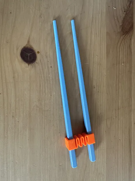 Dụng cụ tập gắp đũa cho bé (Kids' Chopsticks Trainer) - Image 1