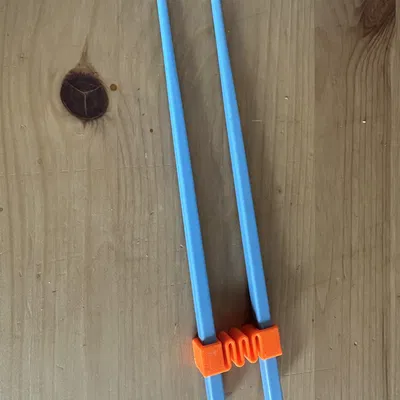 Dụng cụ tập gắp đũa cho bé (Kids' Chopsticks Trainer)