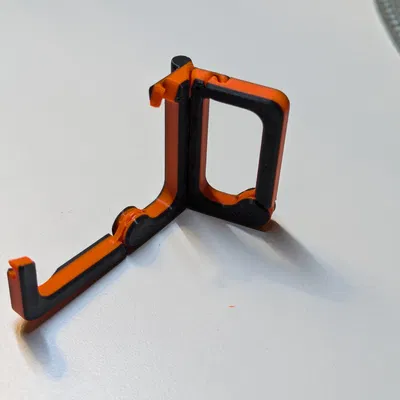 Móc khóa kiêm đế giữ điện thoại bỏ túi