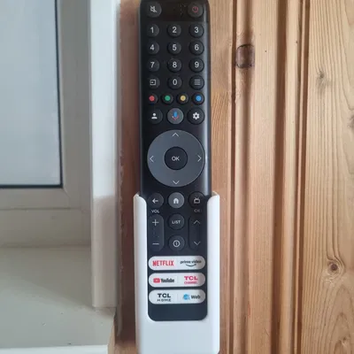 Giá treo remote tivi TCL gắn tường gọn gàng, tiện lợi