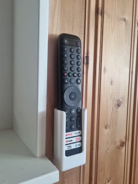 Giá treo remote tivi TCL gắn tường gọn gàng, tiện lợi - Image 2