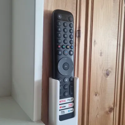 Giá treo remote tivi TCL gắn tường gọn gàng, tiện lợi