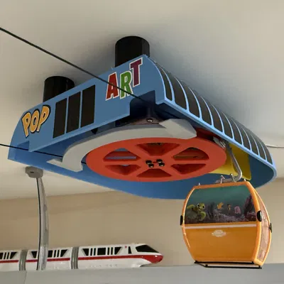 Hệ thống cáp treo gondola có động cơ tương thích với mô hình Disney Skyliner