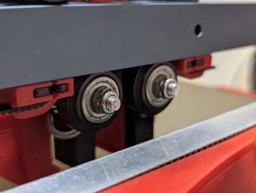 Ngàm kẹp dây đai trục X cải tiến cho Neptune 4 - Image 1