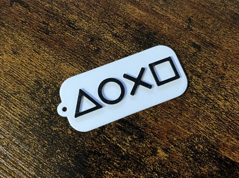 Móc khóa biểu tượng PlayStation 5 - Phụ kiện trang trí gaming độc đáo - Image 1