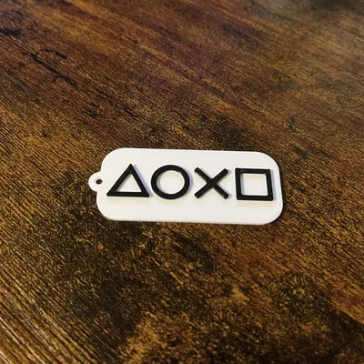 Móc khóa biểu tượng PlayStation 5 - Phụ kiện trang trí gaming độc đáo