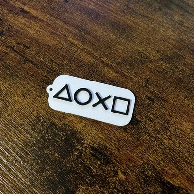 Móc khóa biểu tượng PlayStation 5 - Phụ kiện trang trí gaming độc đáo