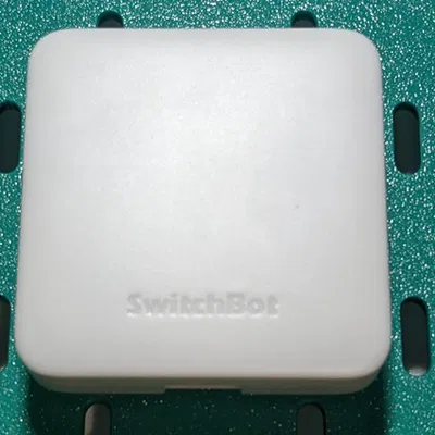 Ngàm gắn bảng Skadis cho SwitchBot Hub Mini / Matter