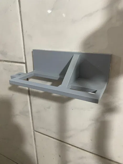 Giá treo máy cạo râu KEMEI 1102 gắn tường gọn gàng, chắc chắn - Image 1