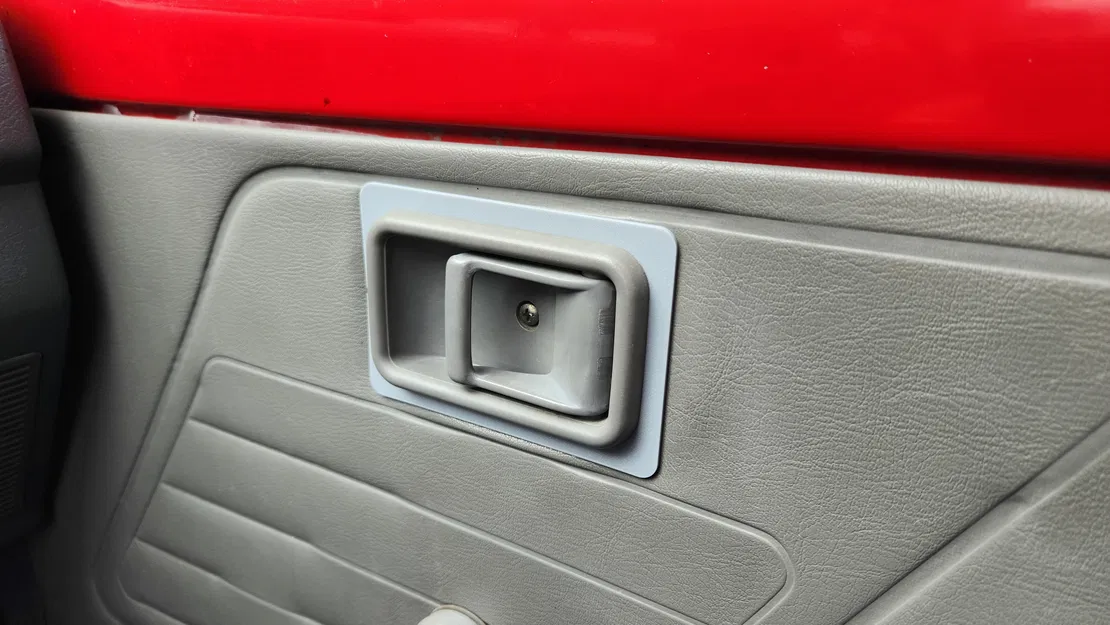 Ốp viền tay nắm cửa trong cho Ford Festiva đời 1988-1993 - Image 1