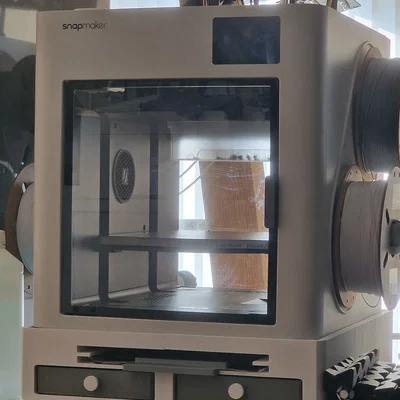 Đế kê máy in 3D Snapmaker U1 tích hợp ngăn kéo và giá để tấm nền