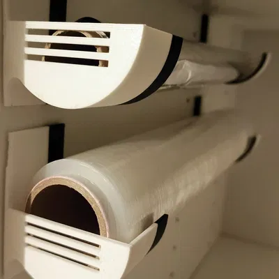 Giá đỡ 3D tiện lợi cho cuộn màng bọc thực phẩm và giấy bạc