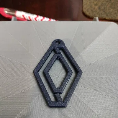 Móc khóa logo Renault xoay độc đáo cho tín đồ đam mê xe hơi