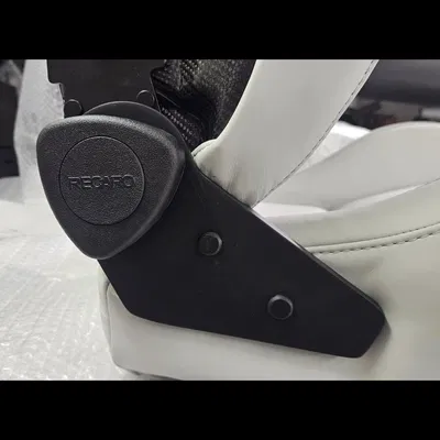 Ốp che núm xoay ngả lưng ghế Audi R7s