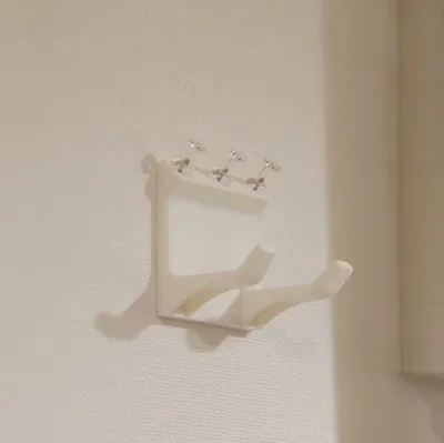 Giá treo vợt và quả cầu lông gắn tường