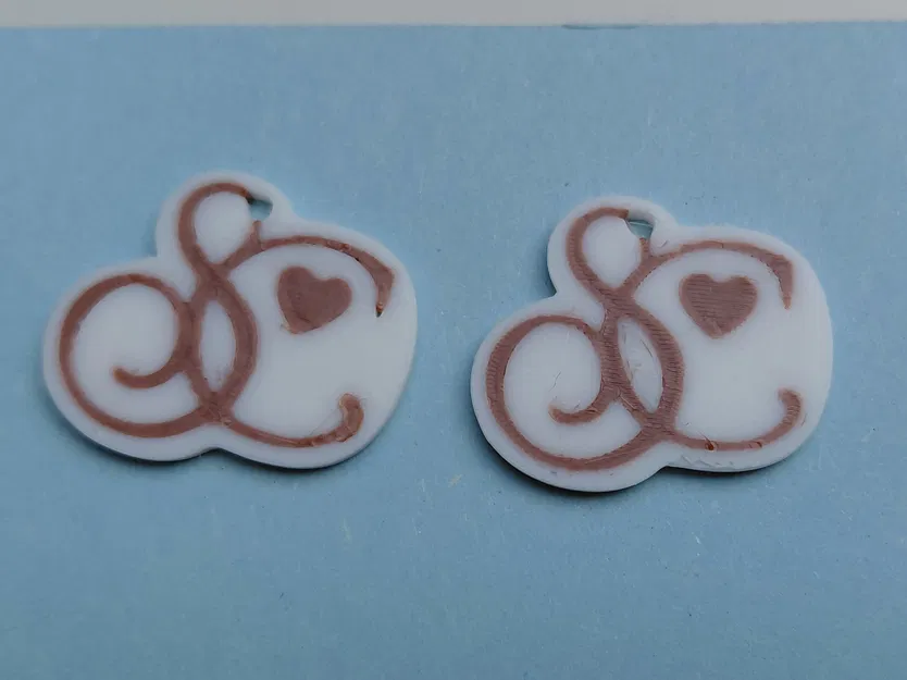 Bông tai / Móc khóa logo Sabrina Carpenter - Image 3