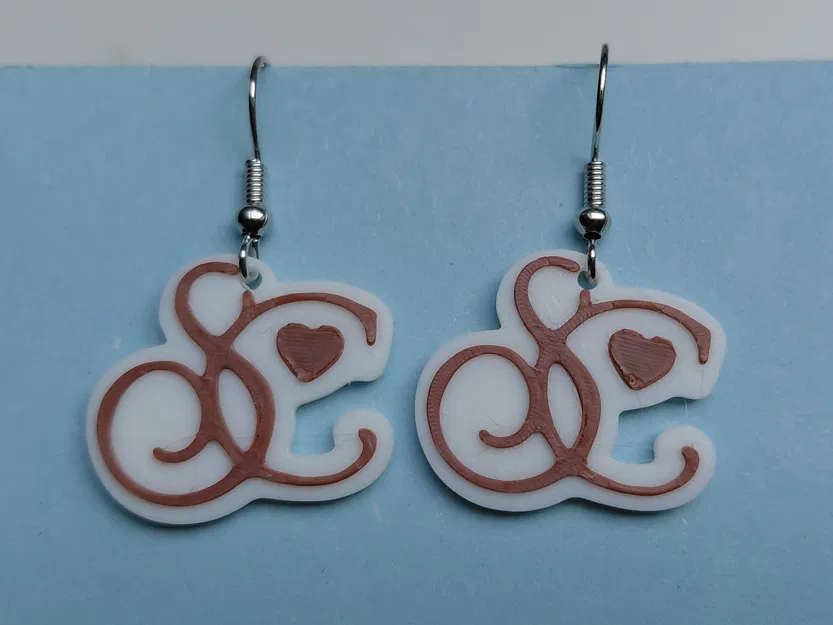 Bông tai / Móc khóa logo Sabrina Carpenter - Image 5