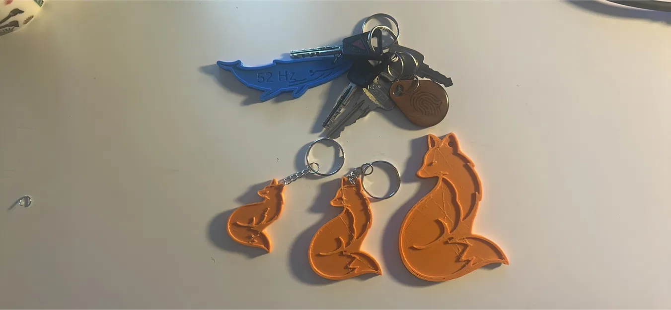 Móc khóa hình cáo tối giản - Image 4